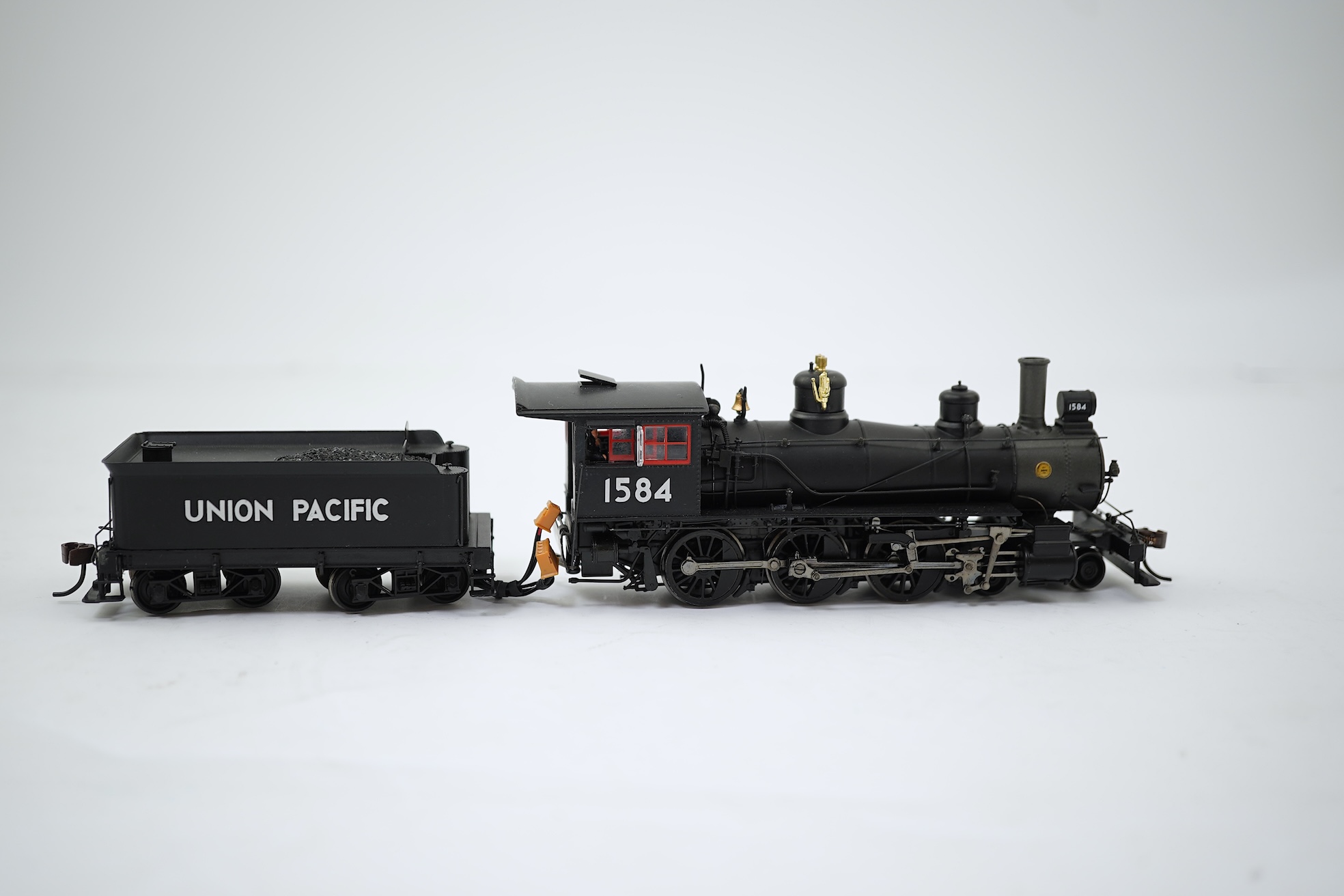 A boxed HO gauge Spectrum by Bachmann model (82303) of Baldwin, 1584, 4-6-0 locomotive with bogie tender, powered for two rail operation.